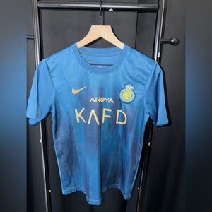 Vintage Nike Kids Blue Soccer Jersey with Yellow Details